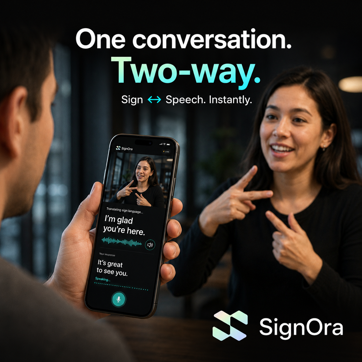 Two adults in conversation, one signing, with SignOra translating sign to speech on a phone in real time